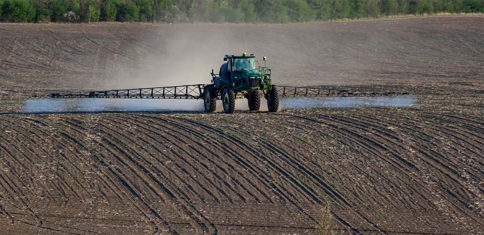 tractor-spraying-soil.png